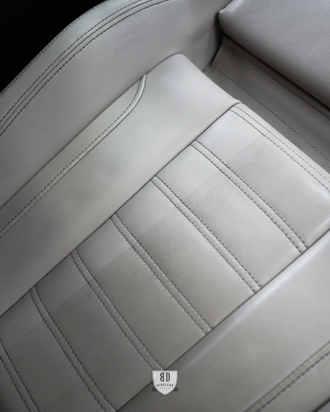 Interior detailing 50 50 comparison on a used car cabin