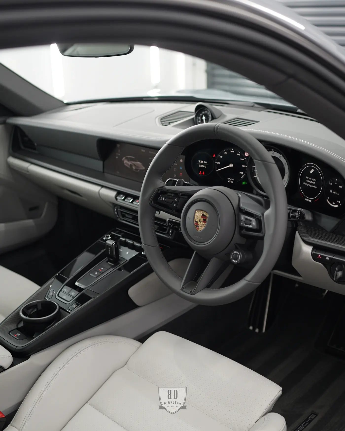 Interior paint protection film installed over gloss trim and touch surfaces